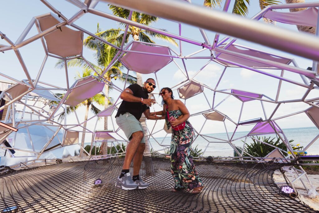 Quest attendees interact with one of the festival installations.