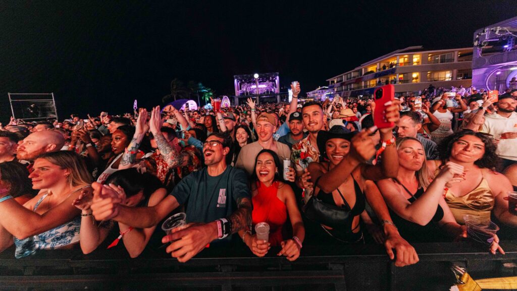 A crowd shot of people enjoying the Quest music festival.