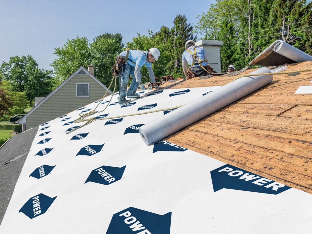 POWER branded ice and water shield is installed to protect a new roof.