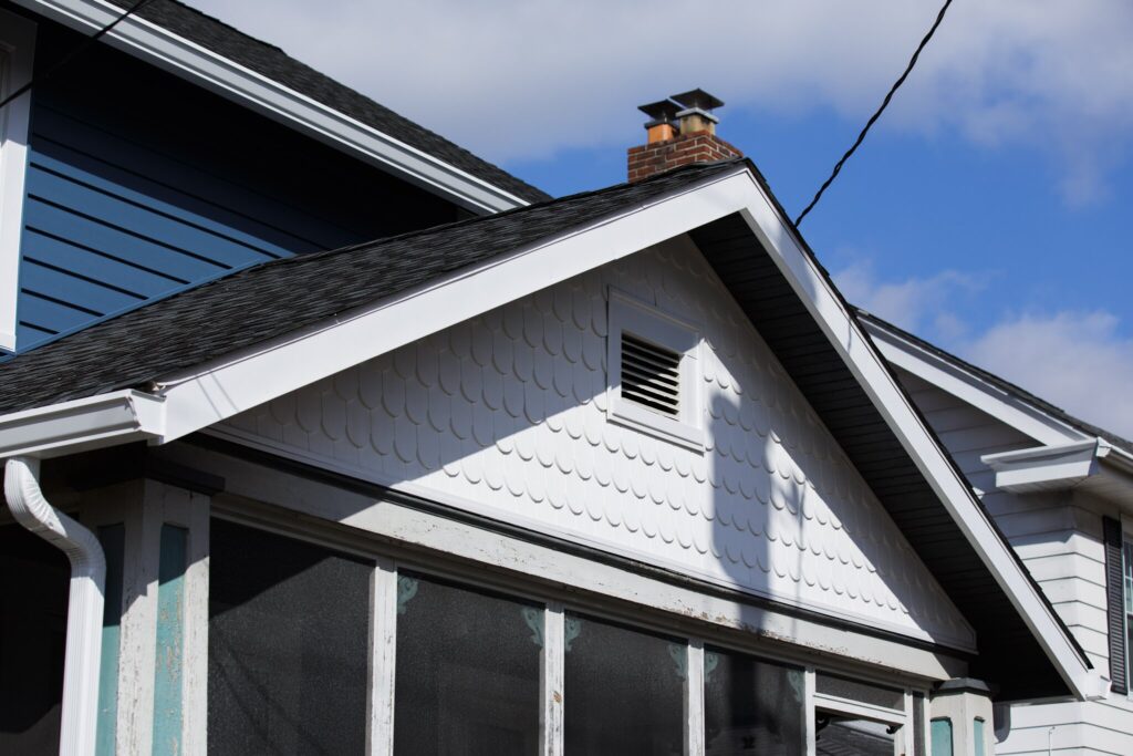 A POWER home with two types of siding, creating visual interest and depth.