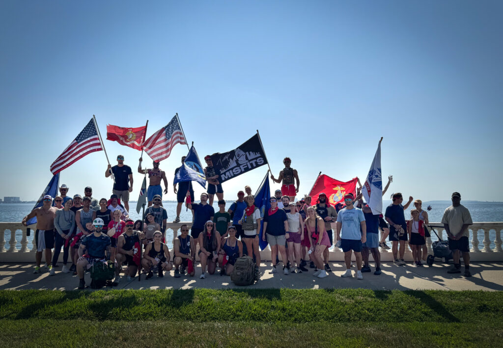 Tampa employees pose for group photo at the end of their Memorial Day Ruck March.