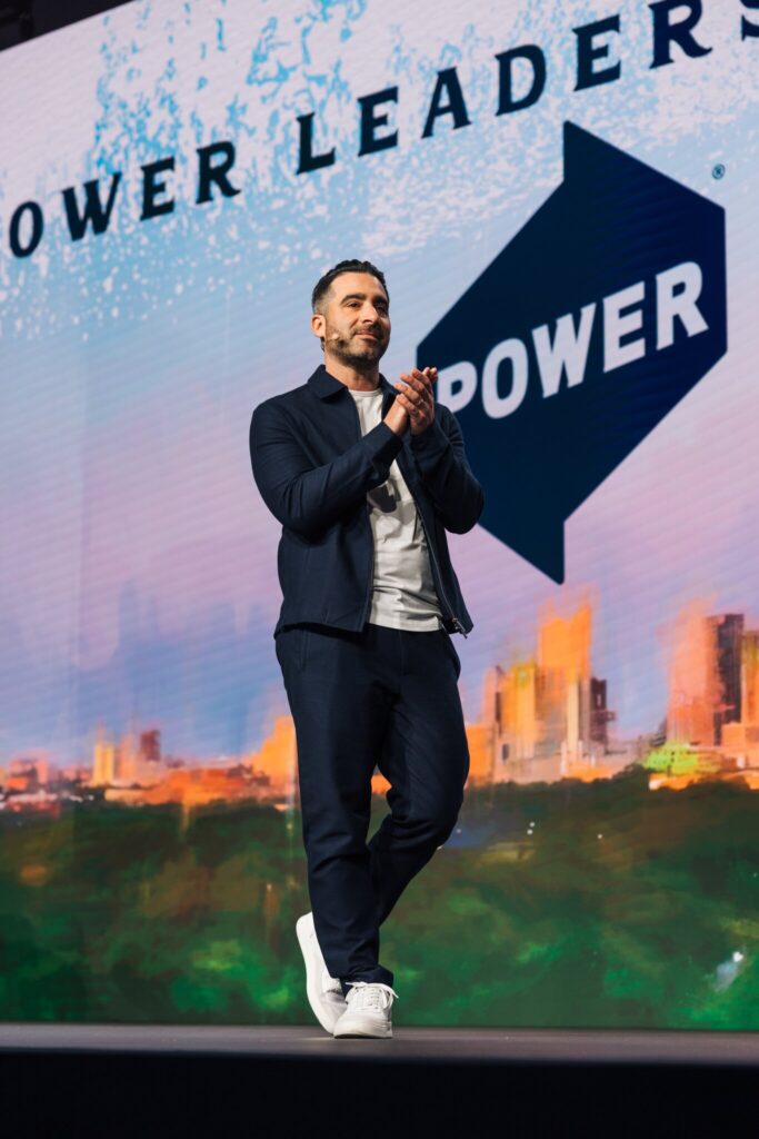 Ty on stage at POWER's Leadership Conference. 