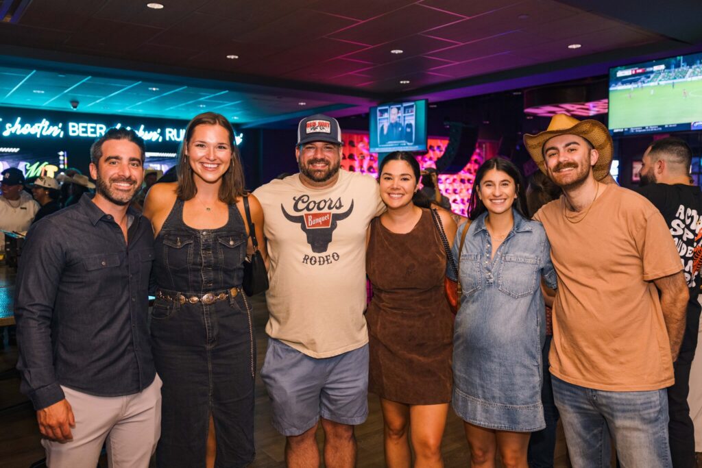 Employees of POWER's People department at a POWER social event. 